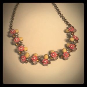 Sweet little pink and yellow floral necklace.
